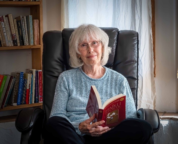Nan Lundeen with book